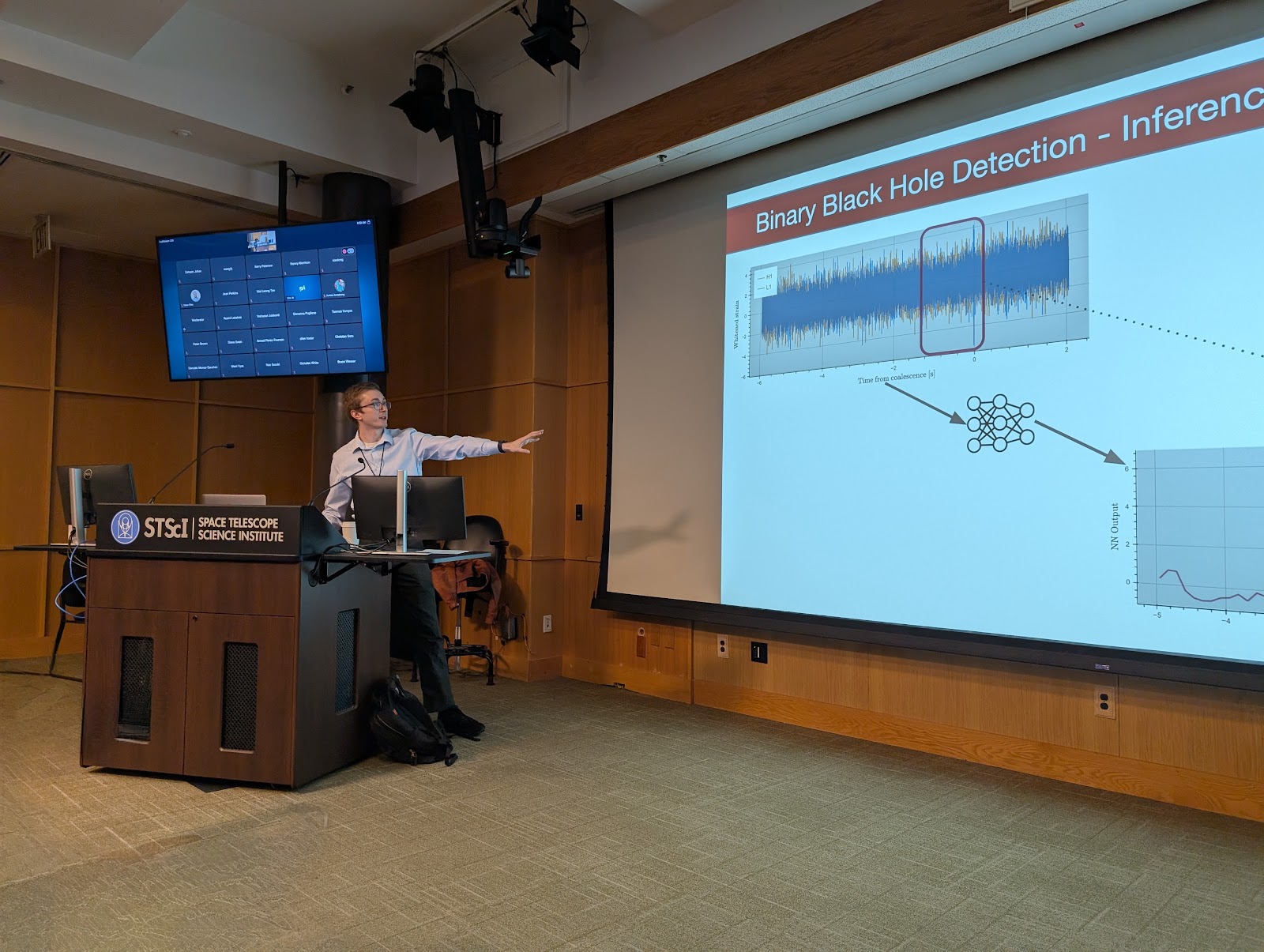 A researcher interacting with complex data visualizations.